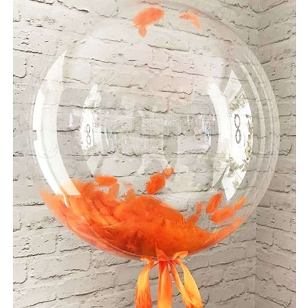 Прозрачный шарик с оранжевыми перьями картинка