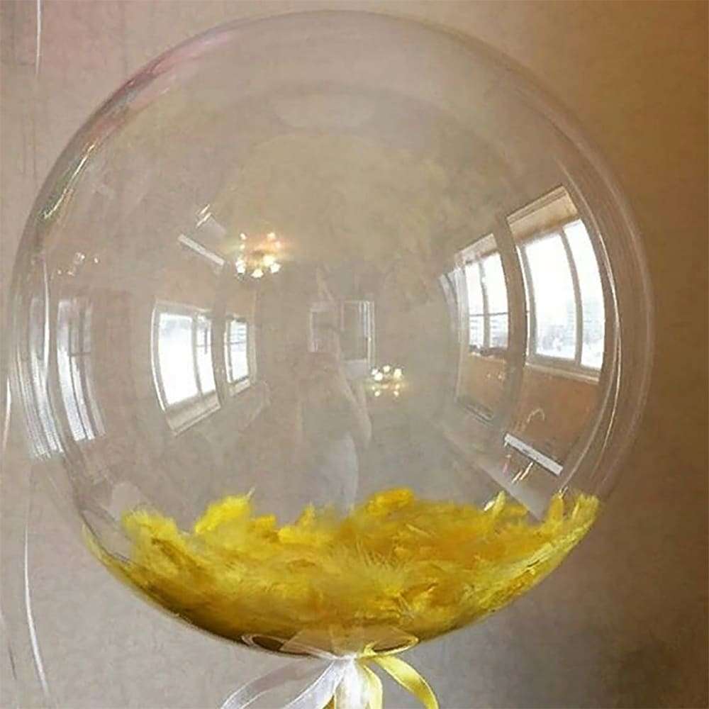 Прозрачный шарик с жёлтыми пёрышками картинка 4